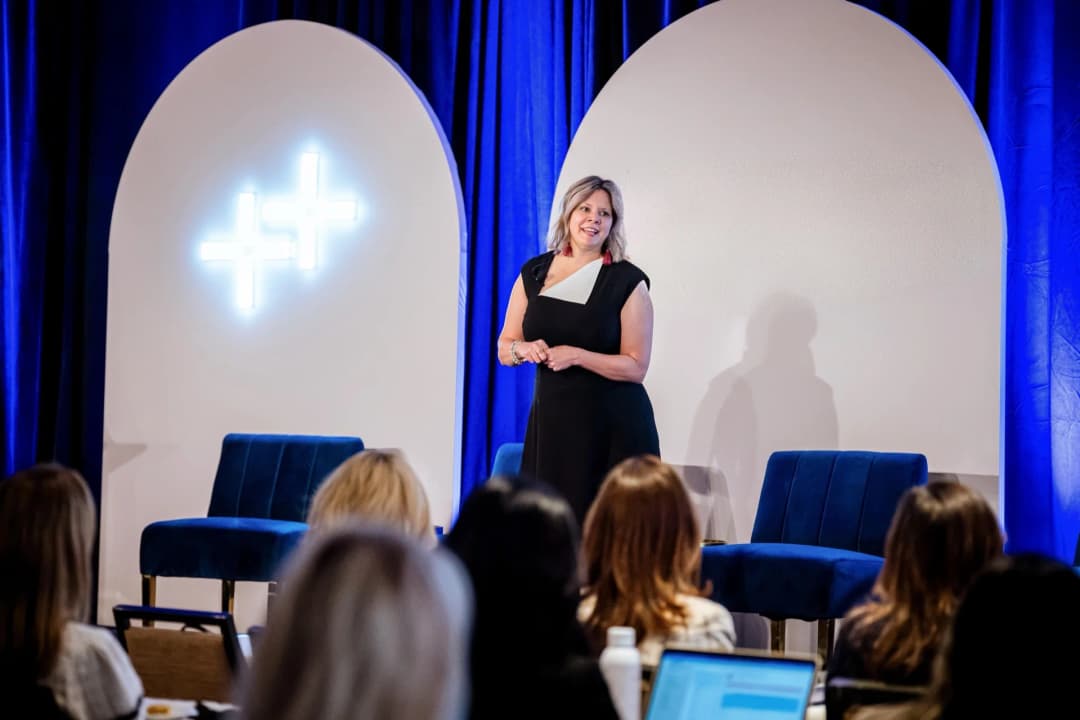 Zanoli presenting on stage