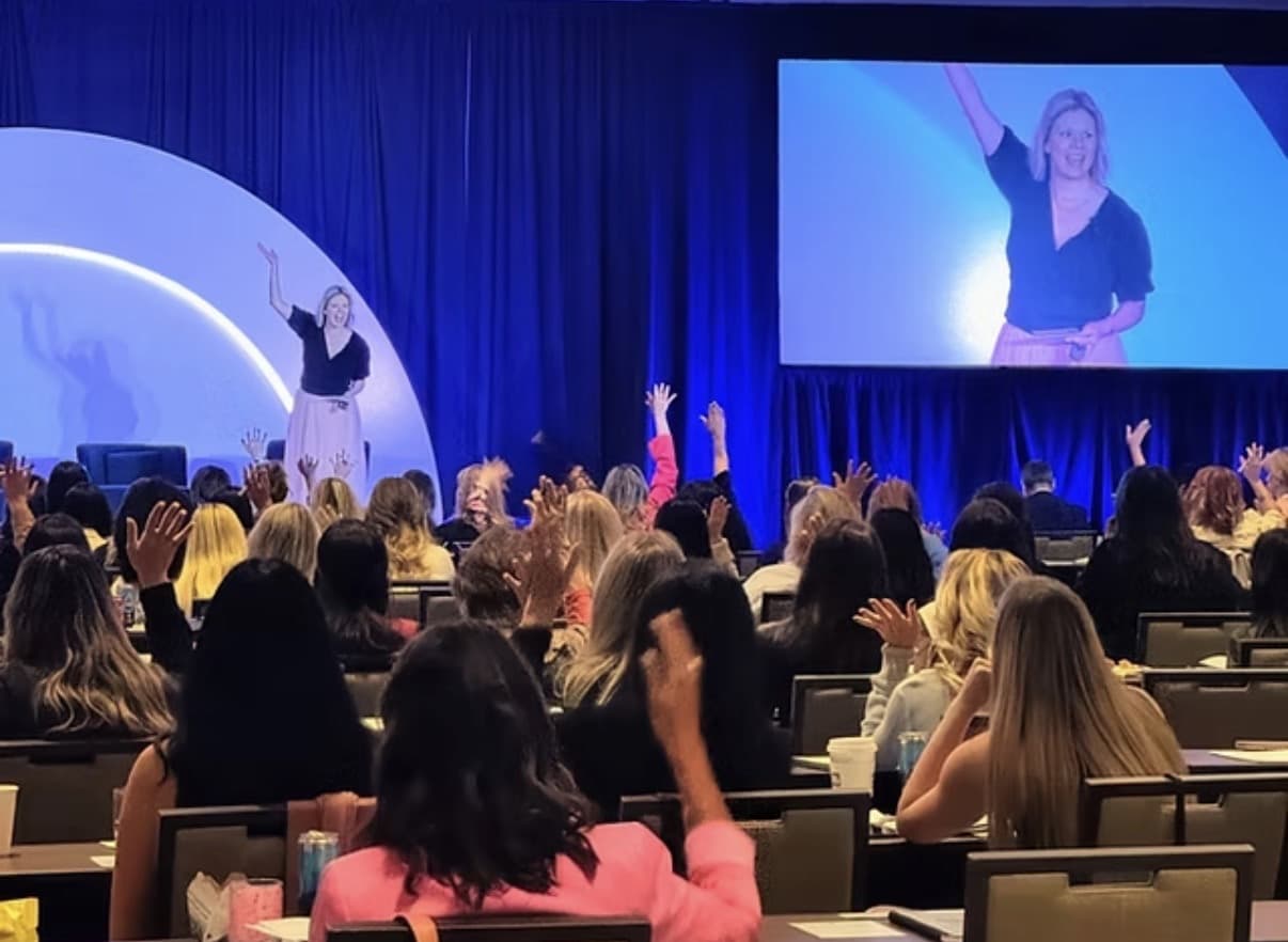 Zanoli presenting on stage